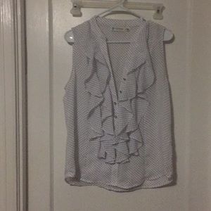 No sleeve dark blue polka dot blouse